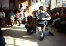 Ron Chvala and Soundman Terry Field filming in a women's workshop.